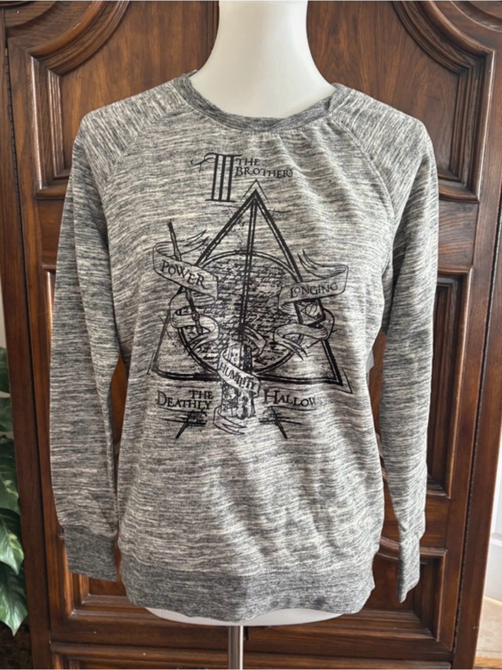 NWT The Wizarding World of Harry Potter The deadly Hallows women's sweater